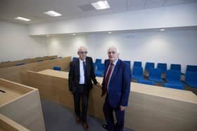 Kevin McLoughlin, senior coroner for West Yorkshire eastern coroner’s service, left, and Les Shaw, Wakefield Council's cabinet member for resources and property, stand inside the main coroner's court at Mulberry House, Merchant Gate, Wakefield.
