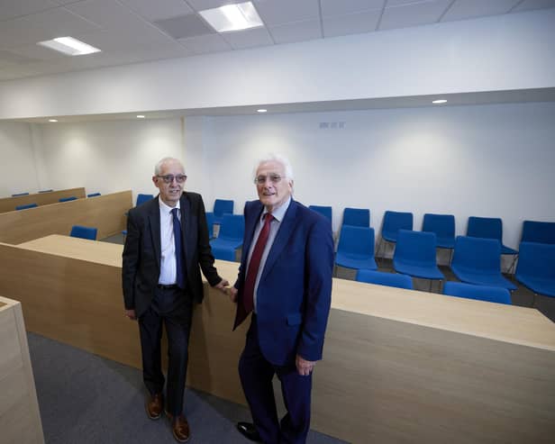 Kevin McLoughlin, senior coroner for West Yorkshire eastern coroner’s service, left, and Les Shaw, Wakefield Council's cabinet member for resources and property, stand inside the main coroner's court at Mulberry House, Merchant Gate, Wakefield.