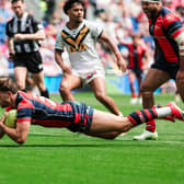 Josh Rourke, seen scoring against Castleford Tigers at Magic Weekend, is back in Wakefield Trinity's squad after injury. Picture by Alex Whitehead/SWpix.com.