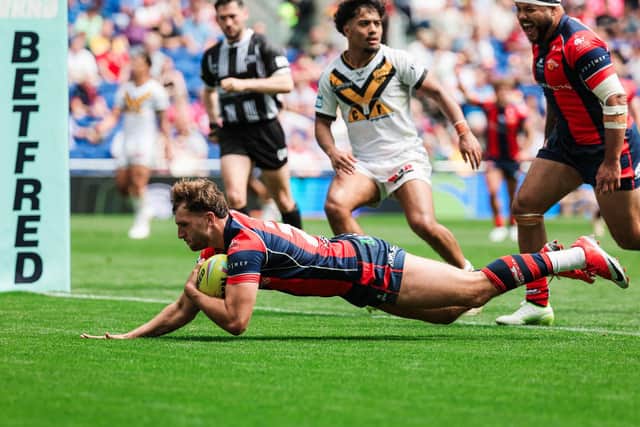 Josh Rourke, seen scoring against Castleford Tigers at Magic Weekend, is back in Wakefield Trinity's squad after injury. Picture by Alex Whitehead/SWpix.com.