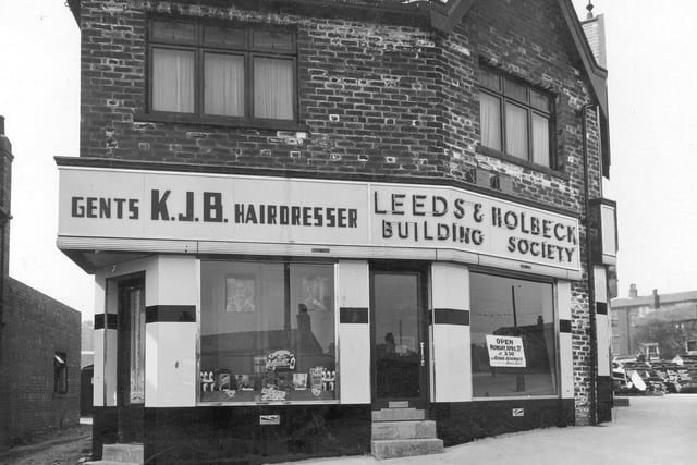 K.J.B. gents hairdressers and the offices of the Leeds and Holbeck building society on Lower Wortley Road in April 1936.