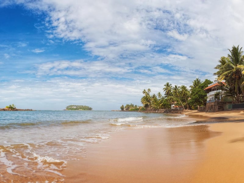 Life's a beach, and all the better for it, along the full length of Beruwala's picture postcard sands