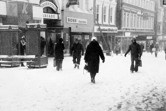 Pedestrians struggle through a blizzard in Leeds city centre in February 1979.