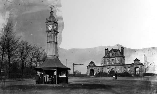 Oakwood Clock located on Princes Avenue. The clock, made by William Potts & Son at a cost of £150, was removed here by the Parks Department from Kirkgate Market in the July of 1912. This was because a new central entrance to the market was under construction in Vicar Lane. In the background, right, old lodges to Roundhay Park can be seen.