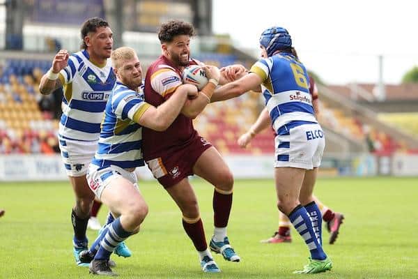 Batley Bulldogs' Martyn Reilly is tackled by Halifax's Daniel Murray during this year's Championship Summer Bash. Picture by John Clifton/SWpix.com.