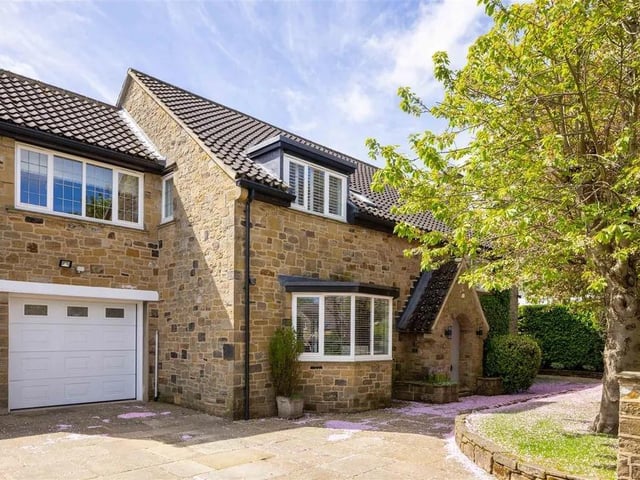 This striking and generous home has been both updated and well-maintained by it's current owners, extended to provide more than 3,200 square foot of space with a stunning south-facing garden