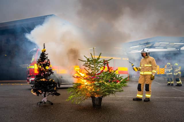 West Yorkshire Fire and Rescue Service conducted a controlled demonstration of a Christmas tree catching fire to show how these types of fires can take hold. Photo: James Hardisty