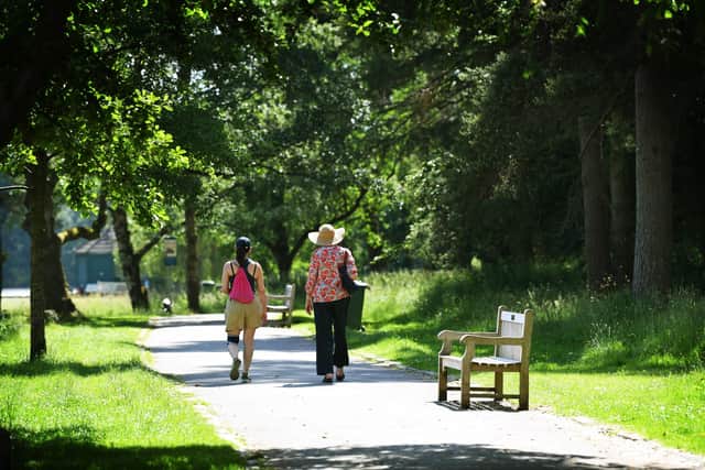 Walkers in Golden Acre Park, Leeds, in the heatwave. Picture: Jonathan Gawthorpe