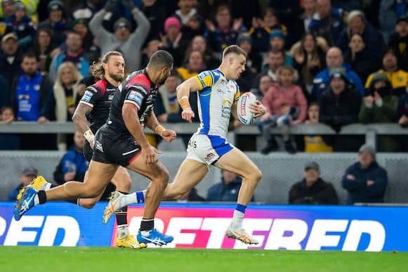 Leeds Rhinos winger Ash Handley outpaces the Salford Red Devls defence to score Super League's round one try of the week. Picture by Allan McKenzie/SWpix.com.