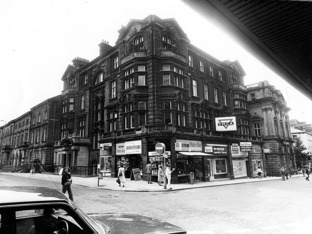 The junction of Albion Street and Albion Place, showing the YMCA building in the centre in June 1984. Shops on the ground floor of the building are Eastwood tobacconists, Bentley films photographic equipment, Raymond Appleson, opticians, a vacant shop and Hunting Lambert travel agents. On the left of the picture is the former County Court building and on the right the Britannia Building Society.
