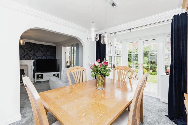 The dining room features double glazed French patio doors leading onto the garden.