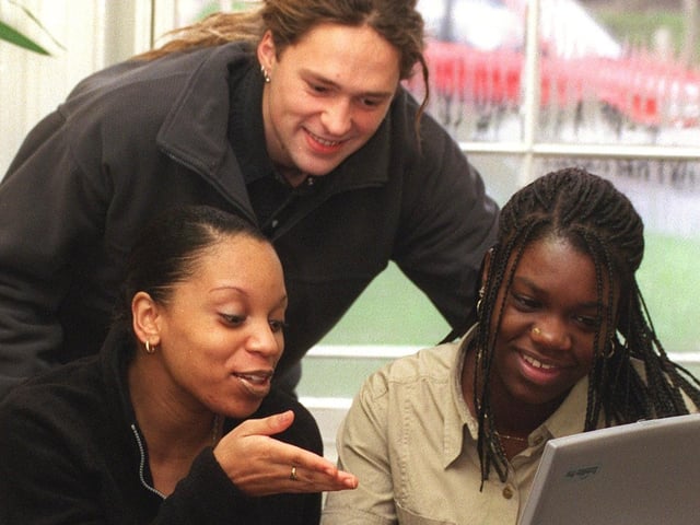 A new multimedia course was launched at Pavilion on Woodhouse Square in December 1999. Pictured is Sam Bainbridge, a multimedia internet resource worker, training Christina Elliott, left, and Gaynor Walker.
