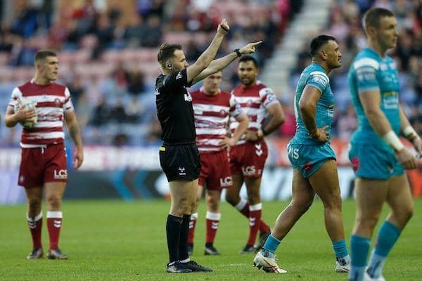 Rhinos' Zane Tetevano is shown a red card by referee Liam Moore. Picture by Ed Sykes/SWpix.com.