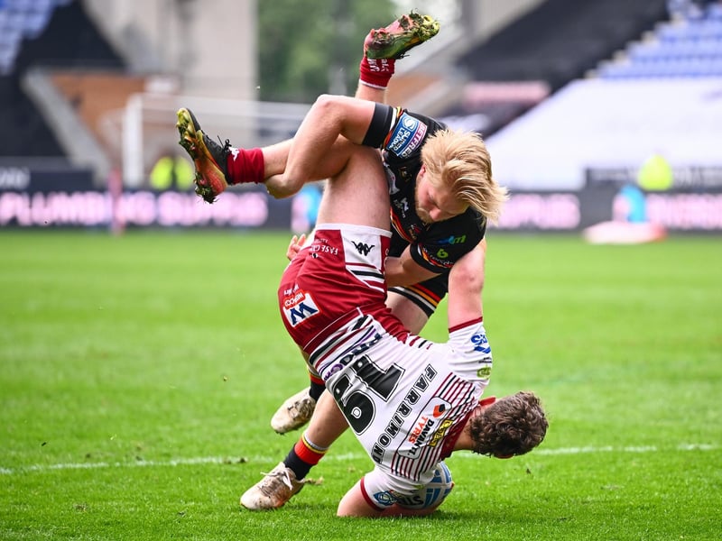 Grade D dangerous throw/lift, 12 penalty points, total points 12 - two-match ban.