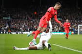 DISMAY: For Brighton's Solly March, top, pictured being fouled by Leeds United defender Junior Firpo in Saturday's 2-2 draw at Elland Road.
Photo by George Wood/Getty Images.