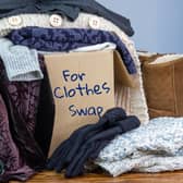 Reuse and recycle clothes by swapping for sustainable fashion and zero waste. Photo: Adobe