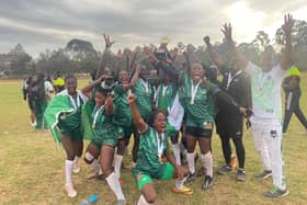 Former Featherstone Rovers player Ade Adebisi (in black top) celebrates with the Nigeria team after their win over Kenya. Picture by Middle East Africa Rugby League