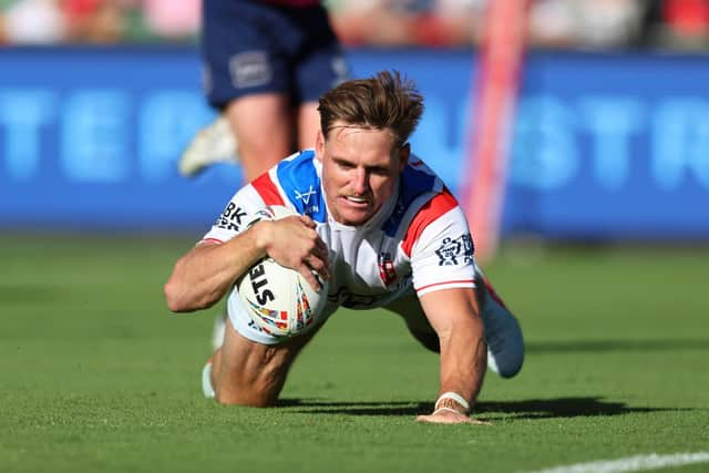 Man of the match AJ Brimson scores for England in their 82-0 rout of France. Picture by Peter Keleman/SWpix.com.