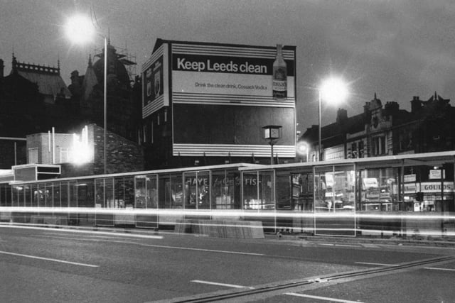 Night scene of the bus stops by the Corn Exchange in September 1973.