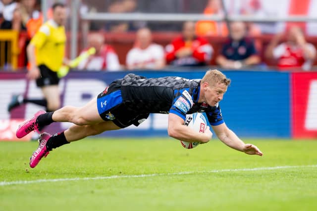 Lachie Miller dives over to score a sensational match-winning try for Leeds Rhinos at Hull KR last month. Picture by Allan McKenzie/SWpix.com.