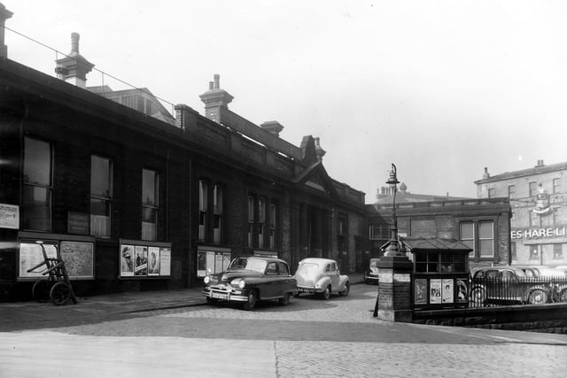 Leeds Central Station on Wellington Street in March 1954. This station was opened on September 18, 1848 for trains on the Leeds - Thirsk Railway, and closed on May 1, 1967. It was later demolished and became the site of the Royal Mail Headquarters. The warehouse of James Hare Ltd, woollen merchants and manufacturers, of 72 Wellington Street, can be seen on the far right.