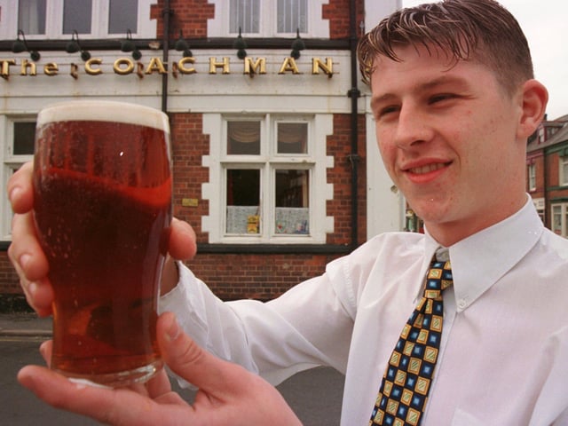 Chees! This is 19-year-old Dean Hoey who in September 1999 had just taken over the license of The Coachman pub. He was believed to be one of the youngest landlords in the country.