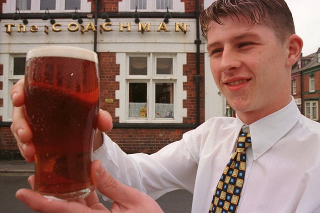 Chees! This is 19-year-old Dean Hoey who in September 1999 had just taken over the license of The Coachman pub. He was believed to be one of the youngest landlords in the country.
