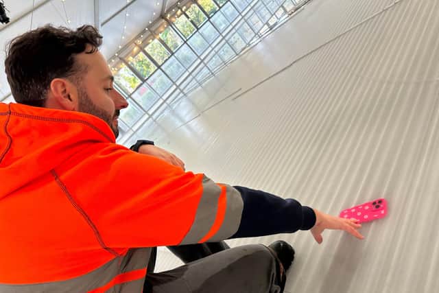 Workman drops daughter's i-phone on a soon-to-be frozen ice-rink and it's been frozen over