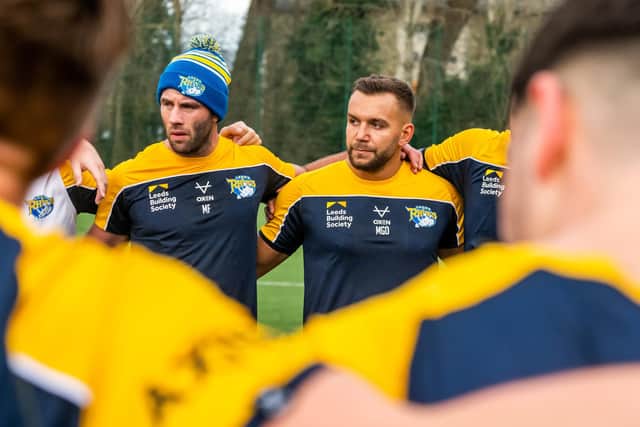 New signings Matt Frawley, left and Mickael Goudemand get to know their new Rhinos teammates during their first training session at the club's Kirkstall base on Tuesday. Picture by James Hardisty.