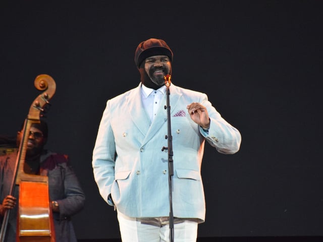 Gregory Porter on stage in his familiar hat
