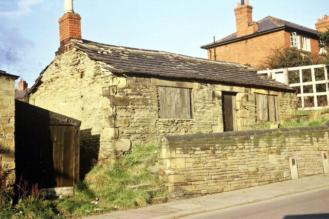 Rose Cottage on Victoria Road pictured in October 1966. It was lived in until about the end of the First World War after which it became a store shed for Stubley (Lindley's) Farm. Although made a listed building in the 1980s this old style Morley single storey flagged cottage remained in a dilapidated condition until it was finally knocked down in 1999.