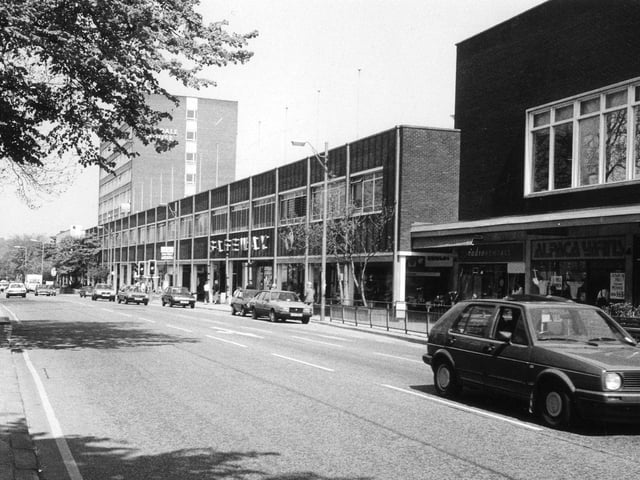 Otley Road in Headingley showing the Arndale Centre running along the right hand side of the road. Shops featured in the photo include Safeway supermarket in the centre and Radio Rentals and Alpaca Yarns towards the right.