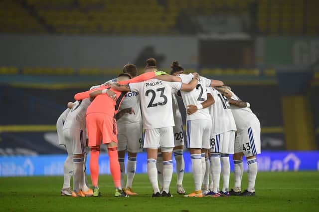 Leeds United players huddle ahead of the Premier League match between Leeds United and West Ham United at Elland Road on December 11, 2020 in Leeds, England.
