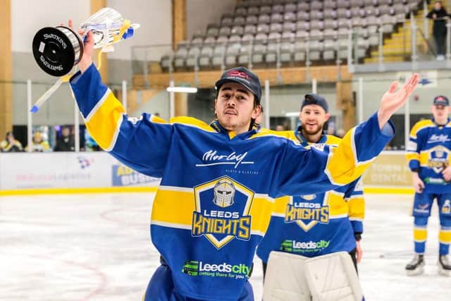 WINNING FEELING: Bailey Perre cvelebrates with the NIHL National championship trophy in front of home fans at Elland Road. Picture courtesy of Leeds Knights IHC
