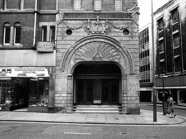 The decorative entrance to number 32 New Briggate. Originally part of the Grand Theatre complex, it opened in 1878 as an assembly room, providing a venue for social gatherings. The Assembly Rooms could seat 1,200 people and along with the theatre itself and a large dining room, occupied the area between Harrison Street and The Grand Arcade.