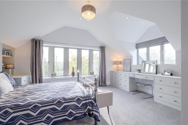 One of the five bedrooms, with stunning far-reaching views.