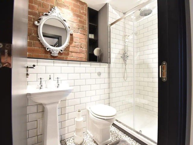 There are two bathrooms, and the en-suite comes with a powerful monsoon shower.