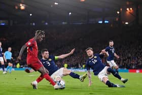 MAIN MEN - Leeds United skipper and Liverpool's Andy Robertson played vital roles in keeping Spain at bay in the late stages of Scotland's famous 2-0 Hampden Park win. Pic: Getty