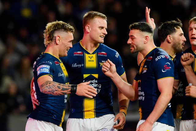 Copoper Jenkins, second from left, scored one try and set up another in Leeds Rhinos' win against Catalans Dragons. Picture by Allan McKenzie/SWpix.com.