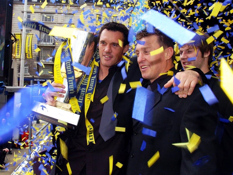 Departing players Matt Adamson and Dave Furner say their farewells to the Rhinos fans in Millennium Square the day after the Grand Final.