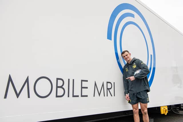 Leeds Rhinos captain Ash Handley on site with the new MRI scanner at AMT Headingley Stadium