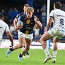 Leeds Rhinos' Zak Lloyd runs at the Toulouse Olympique defence during his debut last week. Picture by Matthew Merrick/SWpix.com.