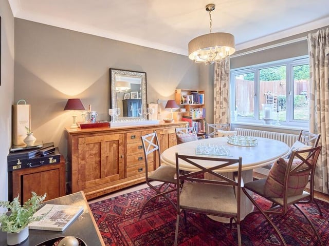 The second rear-facing reception room is a beautifully proportioned formal dining room, enjoying attractive views across the garden.