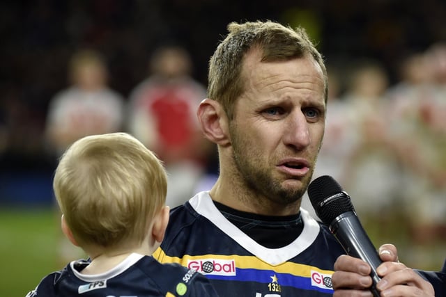 An emotional Rob Burrow, accompanied by one-year-old son Jackson, spoke to fans from the pitch after the match.