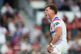 England's AJ Brimson celebrates scoring against Tonga. Picture by Peter Keleman/SWpix.com.