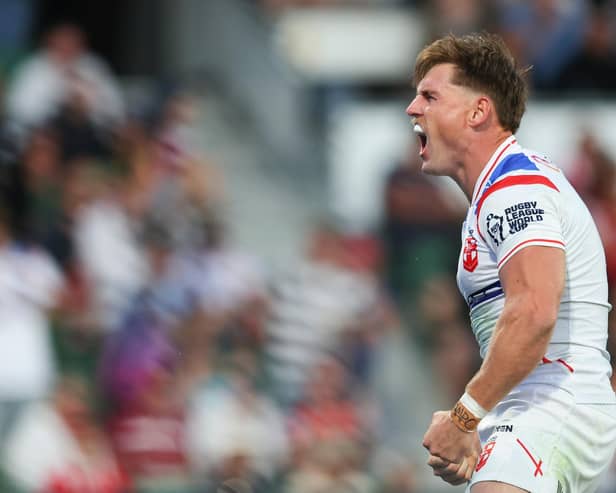 England's AJ Brimson celebrates scoring against Tonga. Picture by Peter Keleman/SWpix.com.