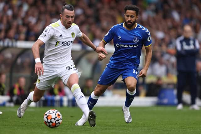 LEEDS, ENGLAND - AUGUST 21: Andros Townsend of Everton in action with Jack Harrison of Leeds United during the Premier League match between Leeds United  and  Everton at Elland Road on August 21, 2021 in Leeds, England. (Photo by Marc Atkins/Getty Images)
