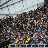 A crowd of 14,168 watched Leeds Rhinos battle their way to a hard-fought win over Catalans Dragons at AMT Headingley.