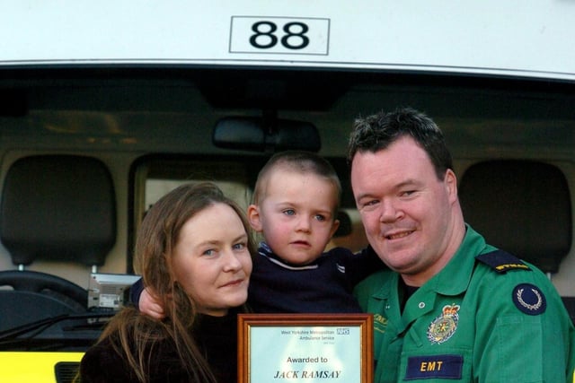 Young Jack Ramsay visited his local ambulance station in Bramley, to pick up his bravery award after raising the alarm when his mum collapsed at home. He is pictured with mum Emma along with emergency medical technician Kevin Hussey who was one of the crew members that responded to the call.