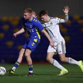 TREBLE: For Luca Thomas, right, in Friday night's season opener for Leeds United's under-21s at Brighton. Photo by Julian Finney/Getty Images.